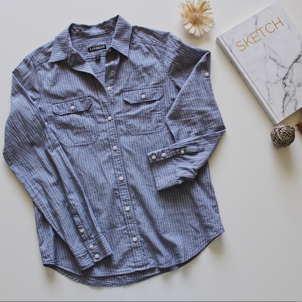 Express women shirt. Light blu